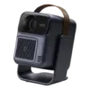 Portable projector with lens on the front, dark gray body and brown carrying strap